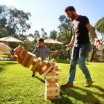 Tumbling Block Tower Falling Over Everybody Is Excited