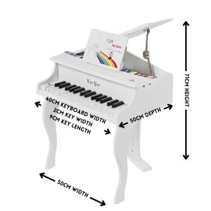 white piano with measurements and play book