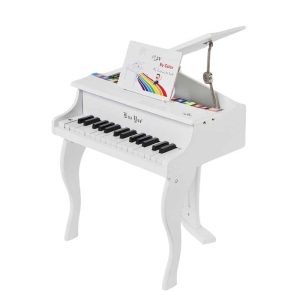 white children's piano with music book
