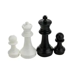 a group of black and white Chess Mega Pieces