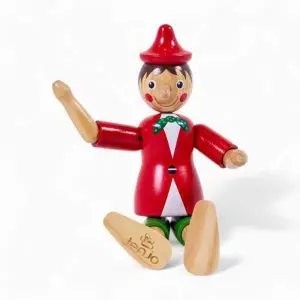 hand painted wooden pinocchio puppet with a little red hat red jacket and green pants